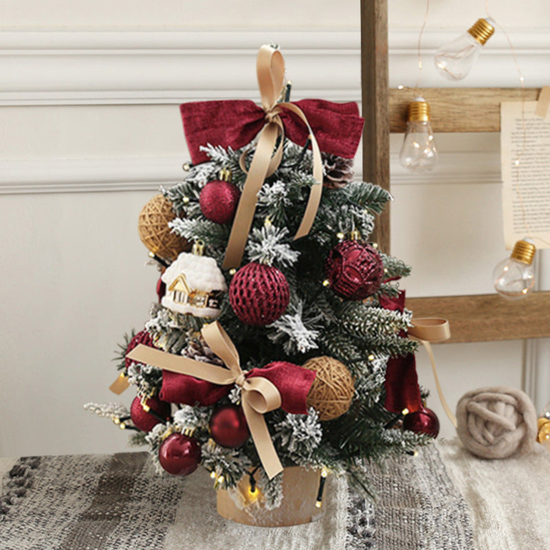 Red Cottage frosted tabletop Christmas tree with burgundy bow and red baubles